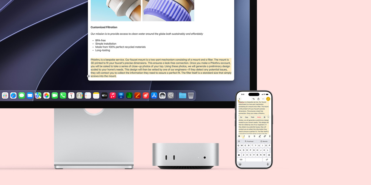Mac mini mostrato di fronte, posizionato sotto a Studio Display, a destra del dispositivo e dello schermo c’è un iPhone; il testo selezionato sull’iPhone, con i comandi Taglia, Copia, Incolla e Inserimento automatico appena sopra, corrisponde al testo evidenziato sullo Studio Display, per mostrare la funzione Appunti condivisi